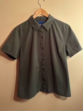 green short sleeved buttonup shirt